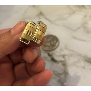 Vintage Monet silver and gold tone face clip earrings‎